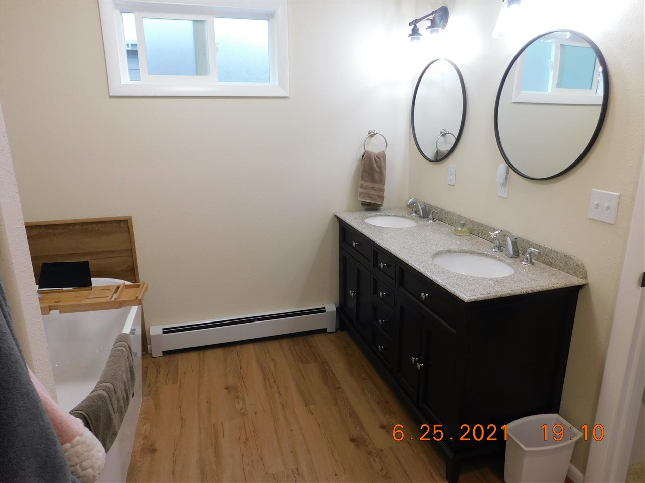 705 Ash Drive Grand Junction, CO 81506 - Photo 14 of 21 a bathroom with a sink and a mirror