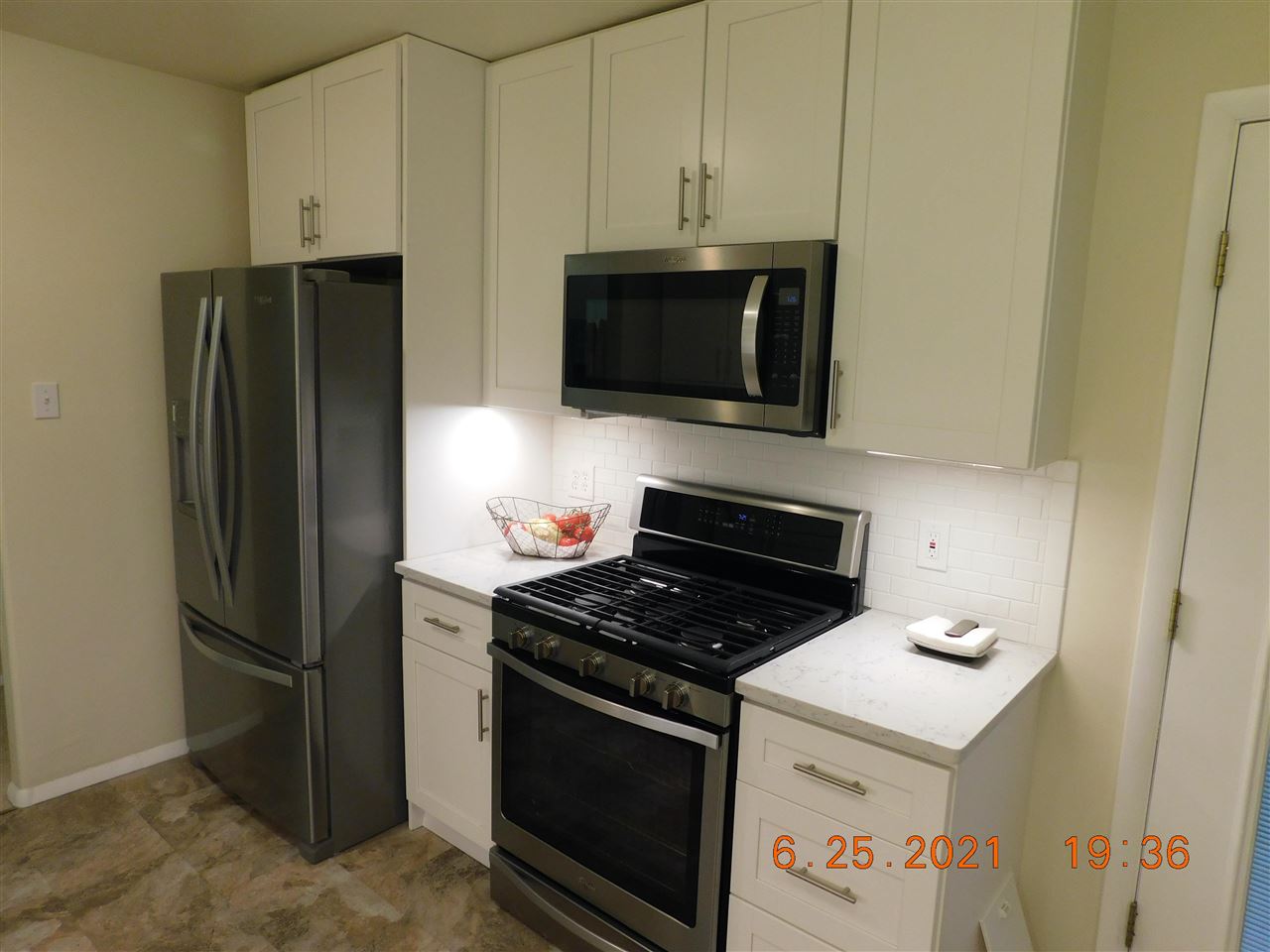 705 Ash Drive Grand Junction, CO 81506 - Photo 16 of 21 a kitchen with cabinets and steel stainless steel appliances