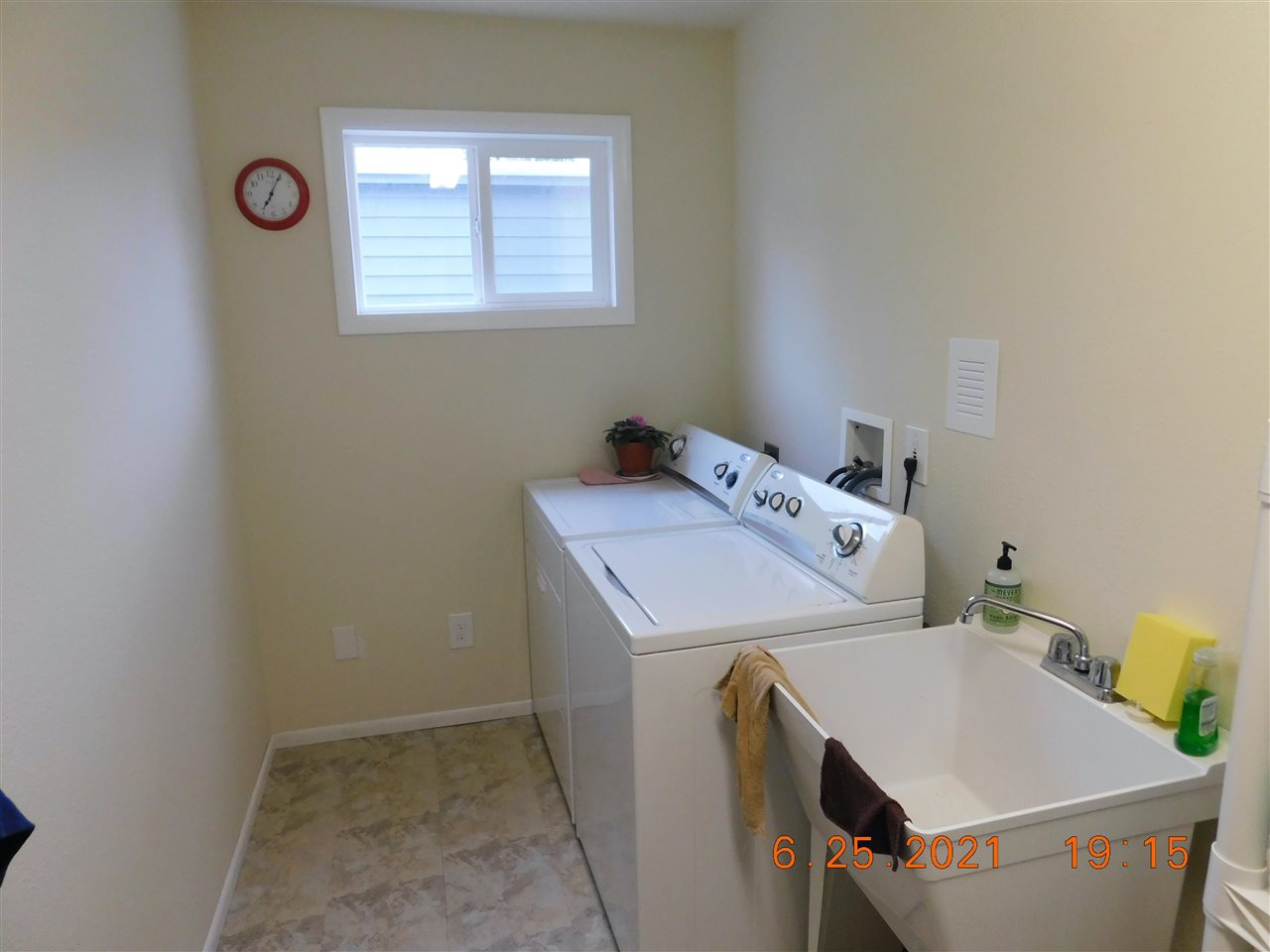705 Ash Drive Grand Junction, CO 81506 - Photo 19 of 21 a utility room with dryer and washer