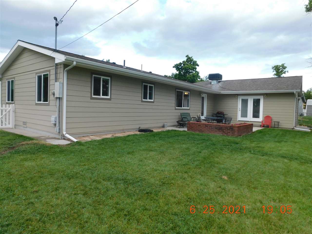 705 Ash Drive Grand Junction, CO 81506 - Photo 20 of 21 a front view of house with yard and outdoor seating