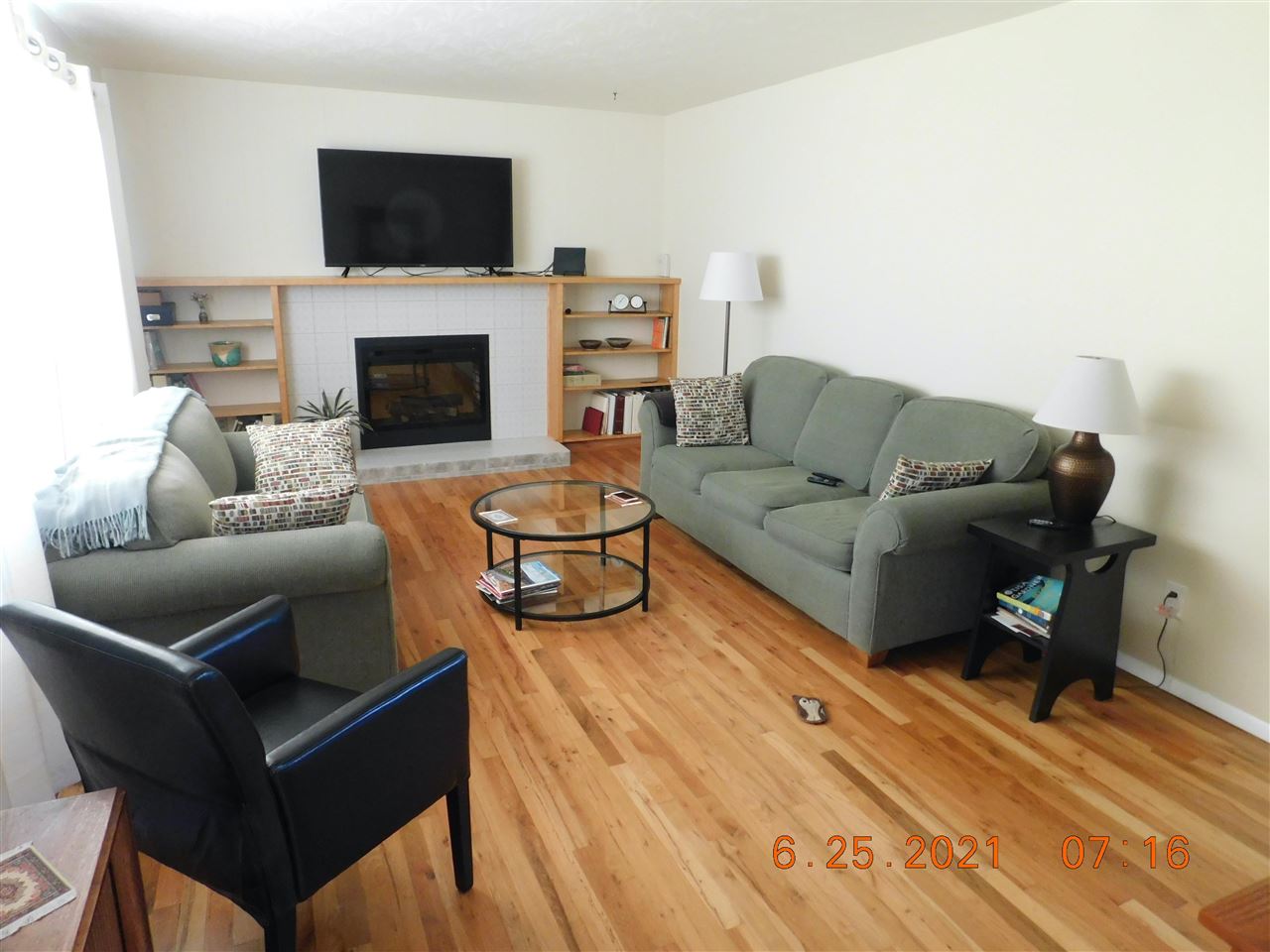 705 Ash Drive Grand Junction, CO 81506 - Photo 3 of 21 a living room with furniture and a flat screen tv