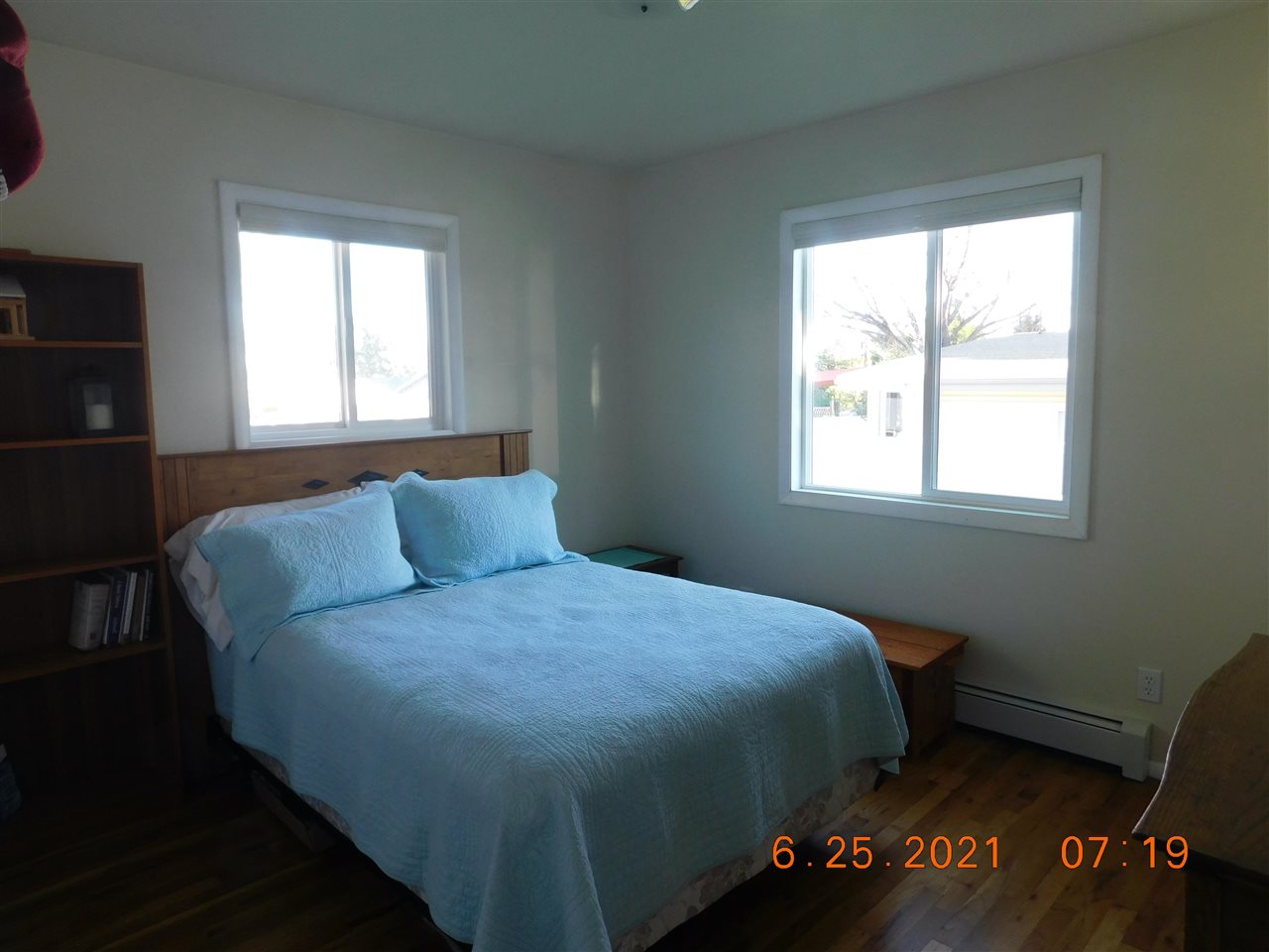 705 Ash Drive Grand Junction, CO 81506 - Photo 4 of 21 a bed sitting in a bedroom next to a window