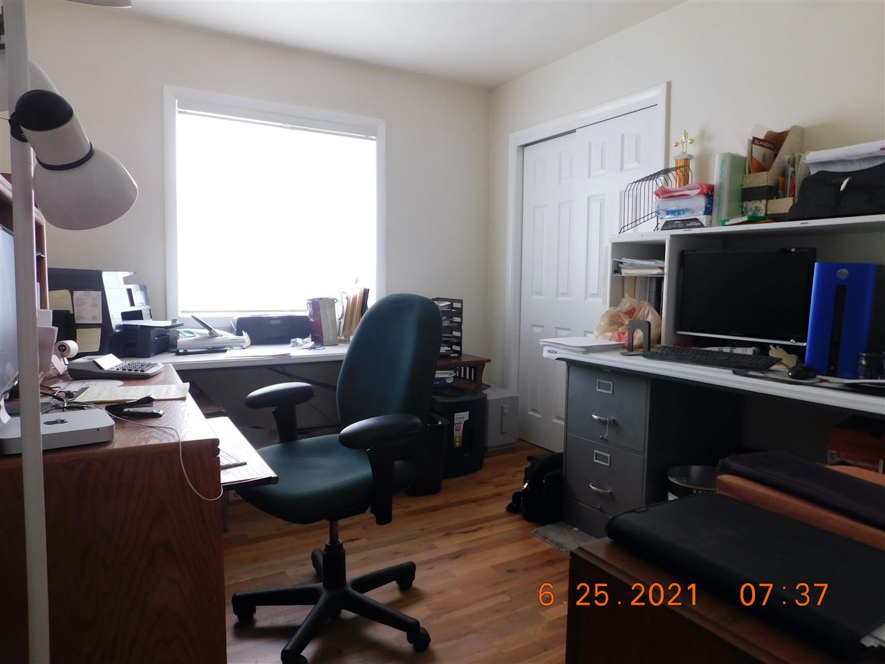 705 Ash Drive Grand Junction, CO 81506 - Photo 7 of 21 a view of a workspace with furniture and a window