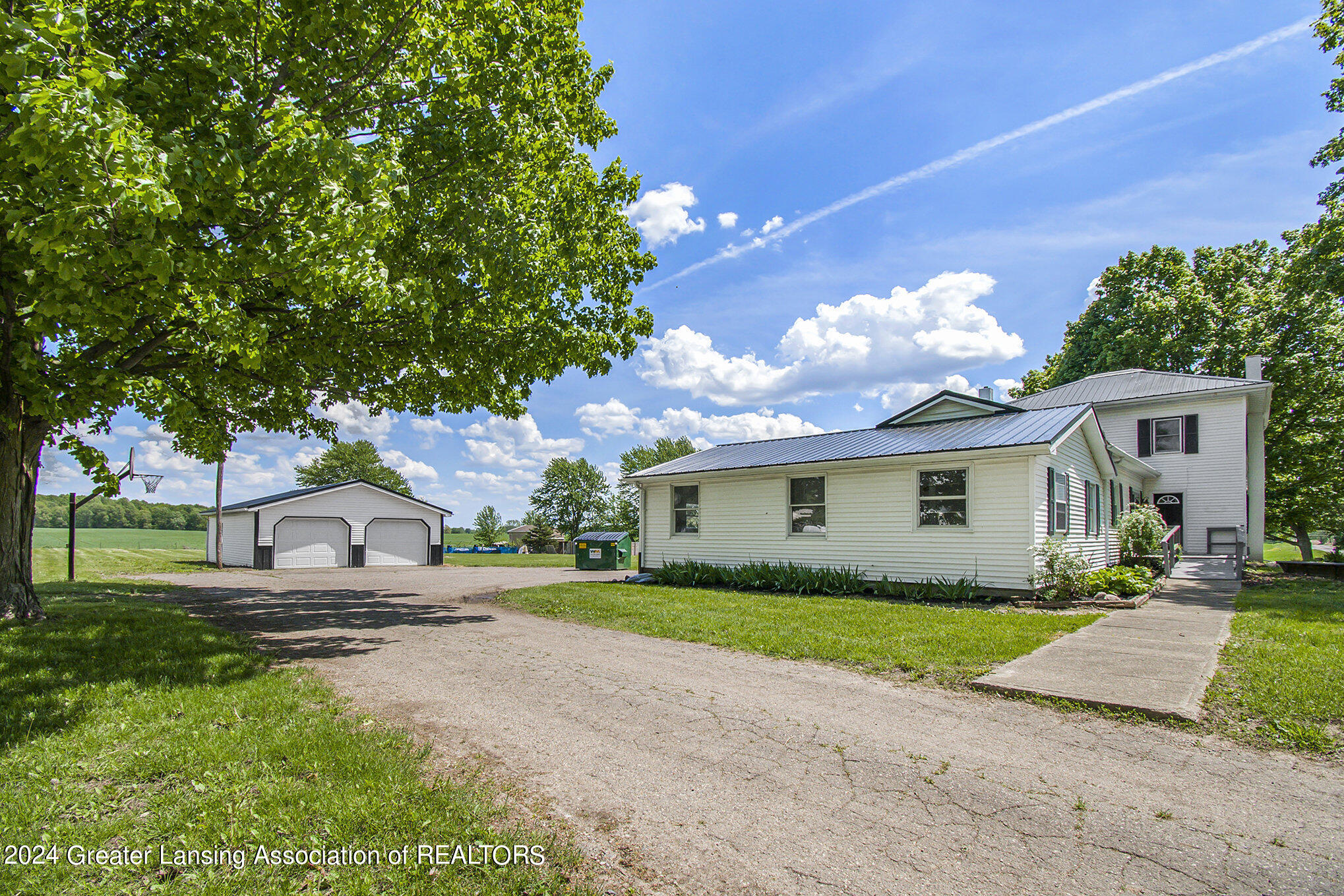 4427 South Cochran Road Charlotte, MI 48813 - Photo 35 of 38 Side
