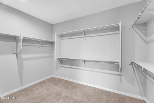 a view of an empty walk in closet