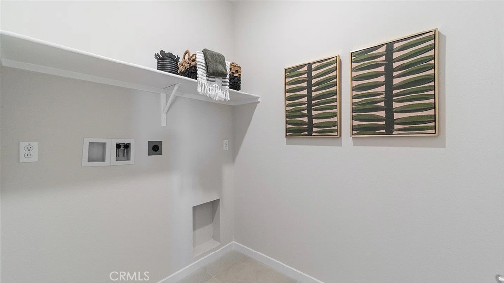 2577 Cloudview Privado Ontario, CA 91761 - Photo 14 of 19 a view of kitchen and utility room