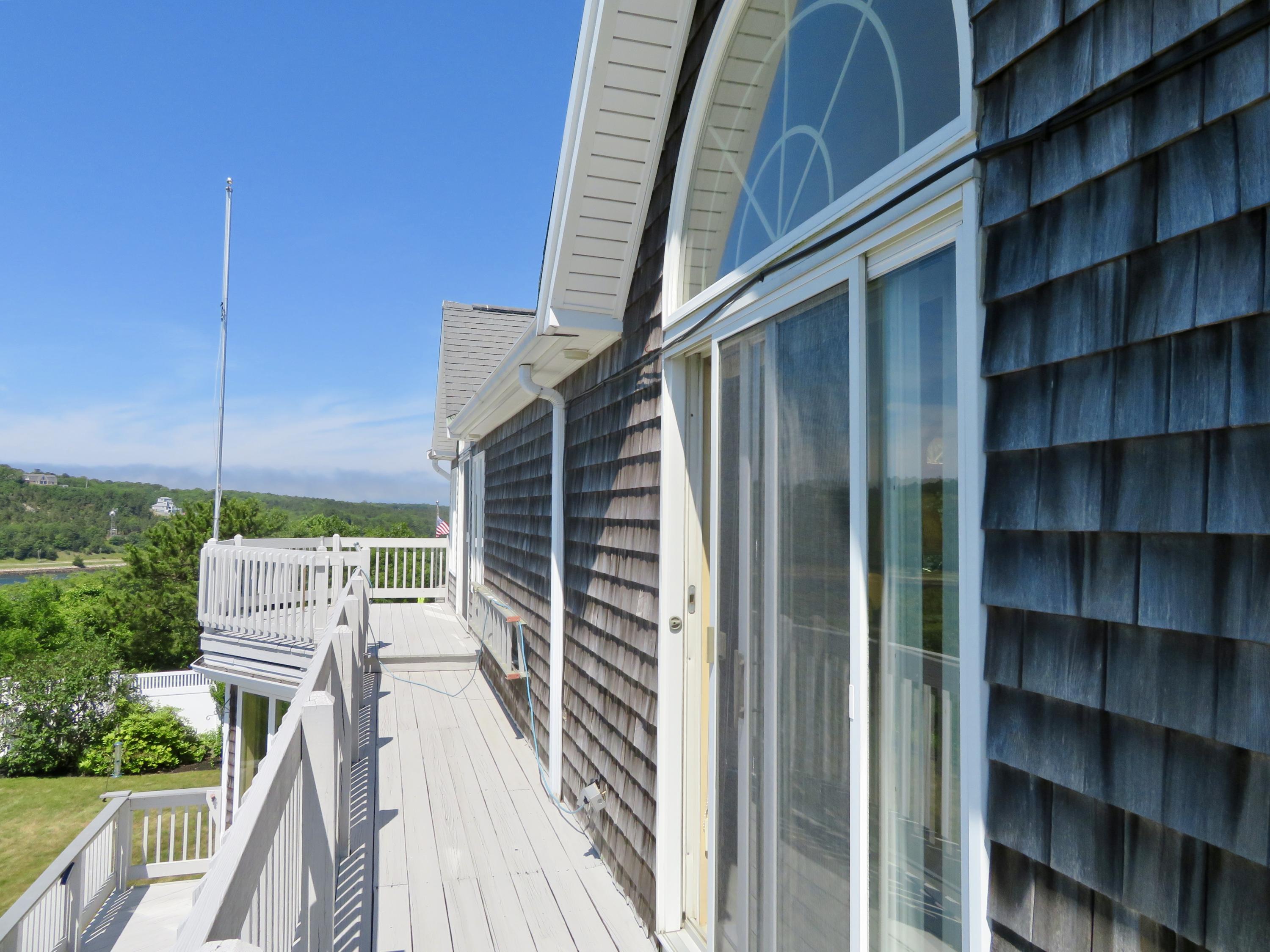 19 Long Boat Road Bourne, MA 02532 - Photo 26 of 33 a view of balcony with wooden floor and fence