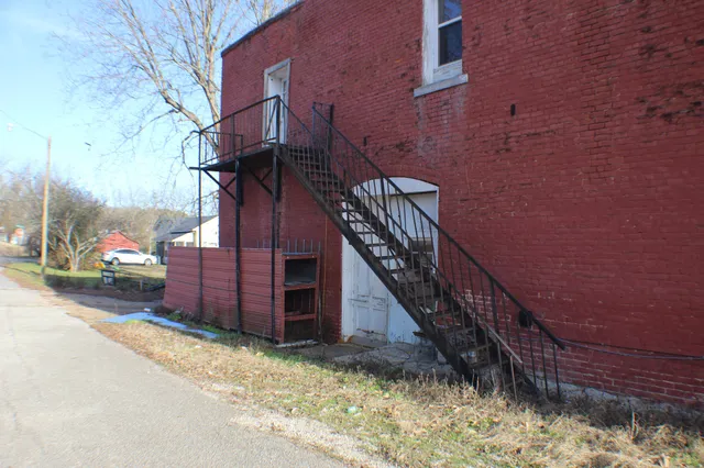 a view of an entryway and livingroom with furniture