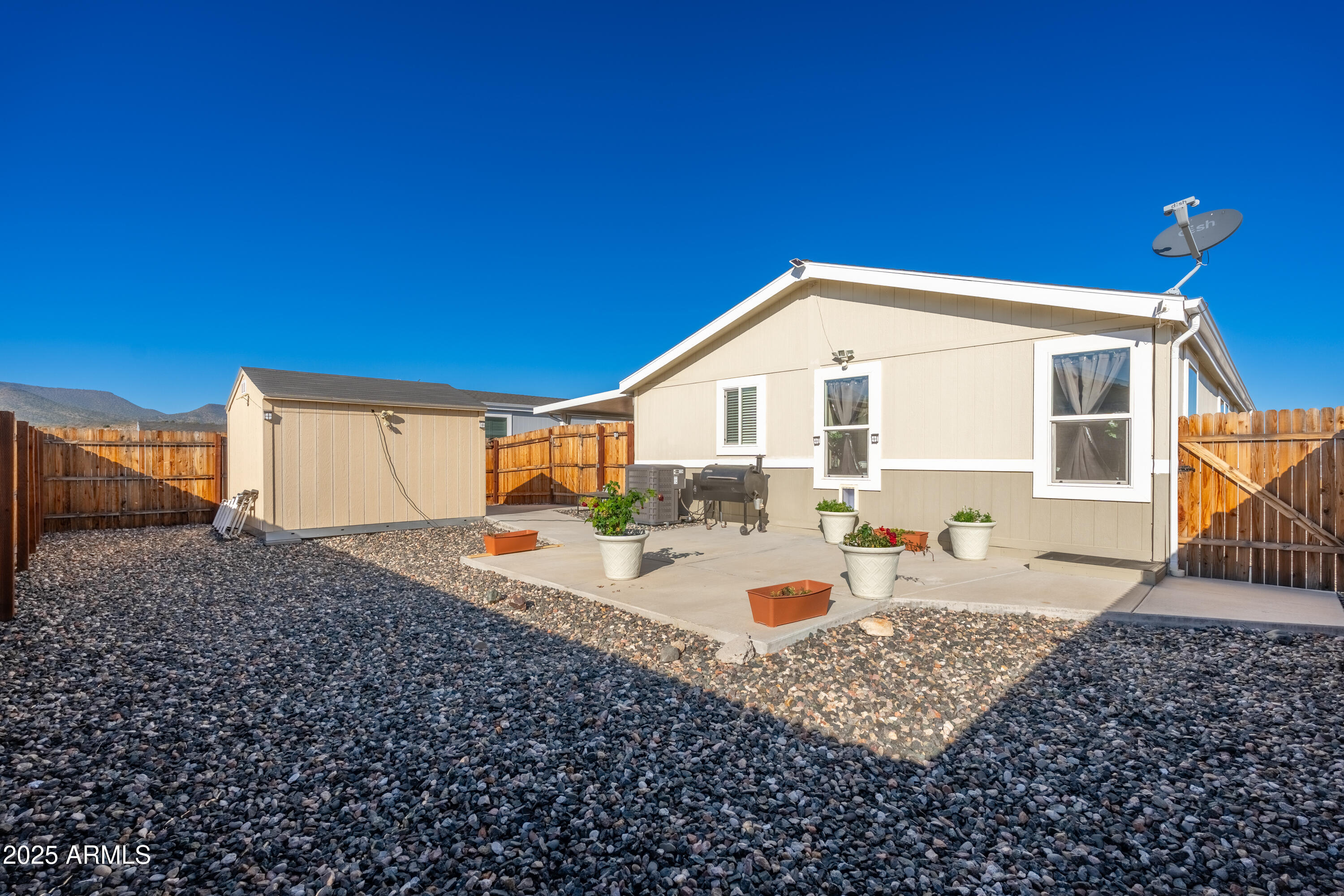 1033 Wheeler Road Camp Verde, AZ 86322 - Photo 30 of 51 a front view of a house with patio