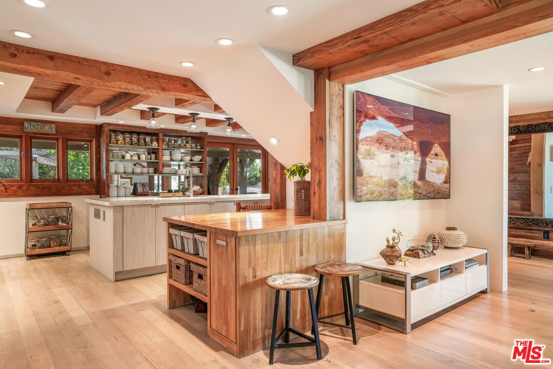 7336 Studio Road West Hills, CA 91304 - Photo 14 of 56 a living room with furniture and a painting on the wall