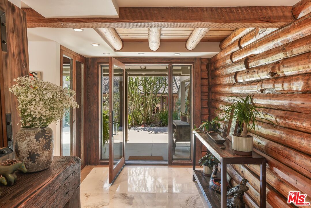 7336 Studio Road West Hills, CA 91304 - Photo 2 of 56 a view of an entryway with wooden floor