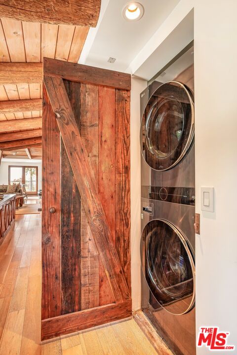 7336 Studio Road West Hills, CA 91304 - Photo 25 of 56 a view of a hallway with washer and dryer