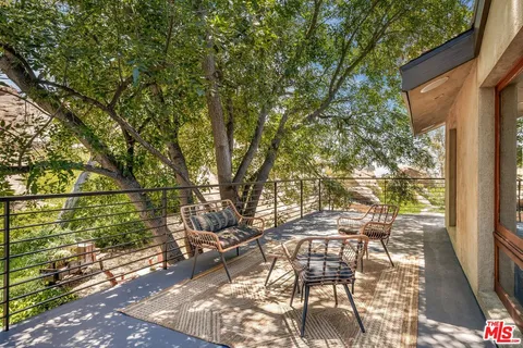 a view of a yard with some trees