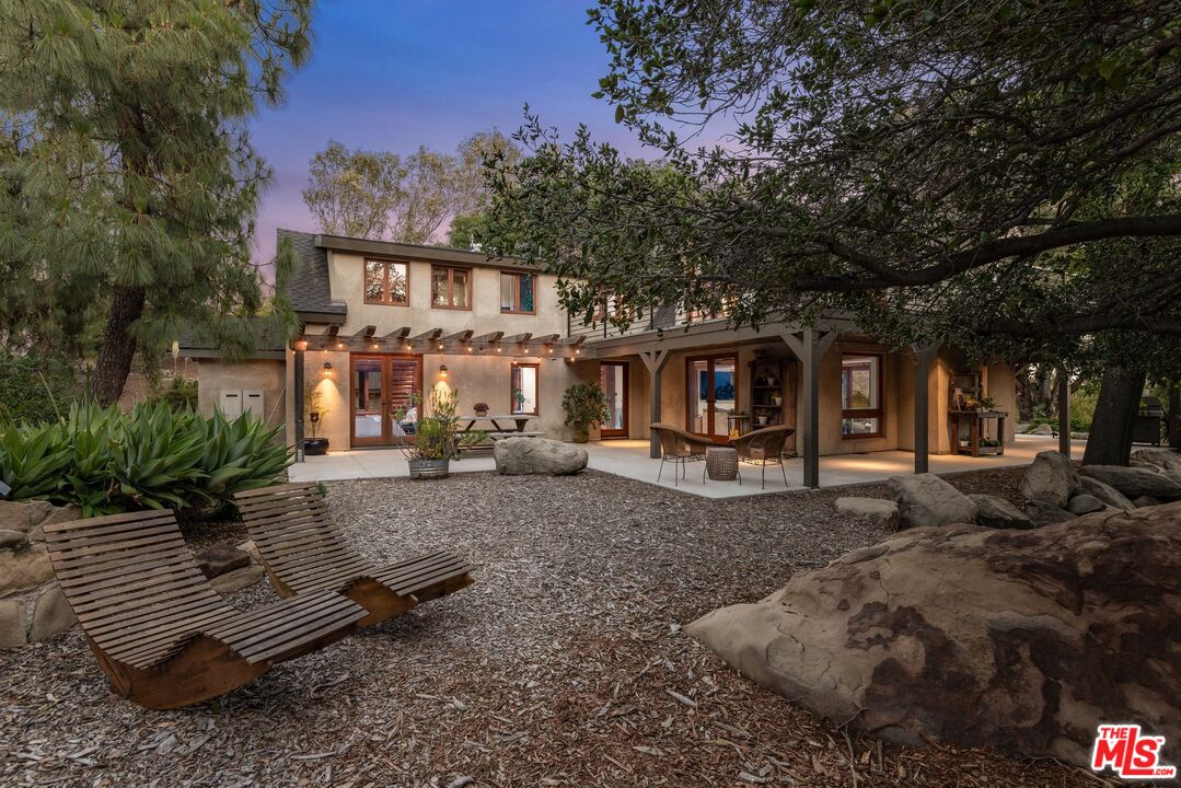 7336 Studio Road West Hills, CA 91304 - Photo 48 of 56 a view of a house with backyard and sitting area