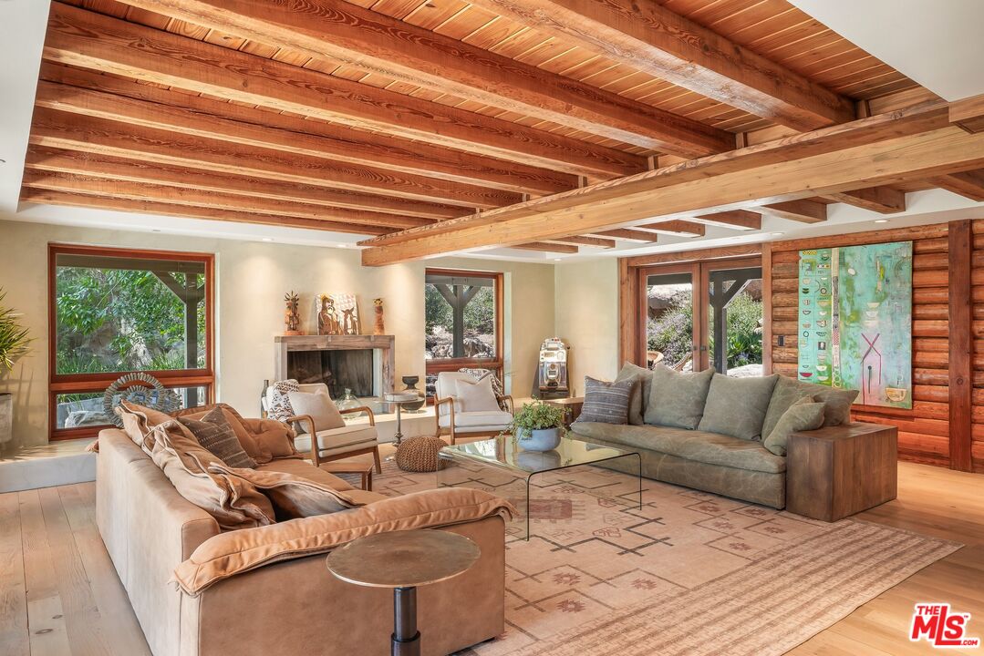 7336 Studio Road West Hills, CA 91304 - Photo 7 of 56 a living room with furniture and a large window