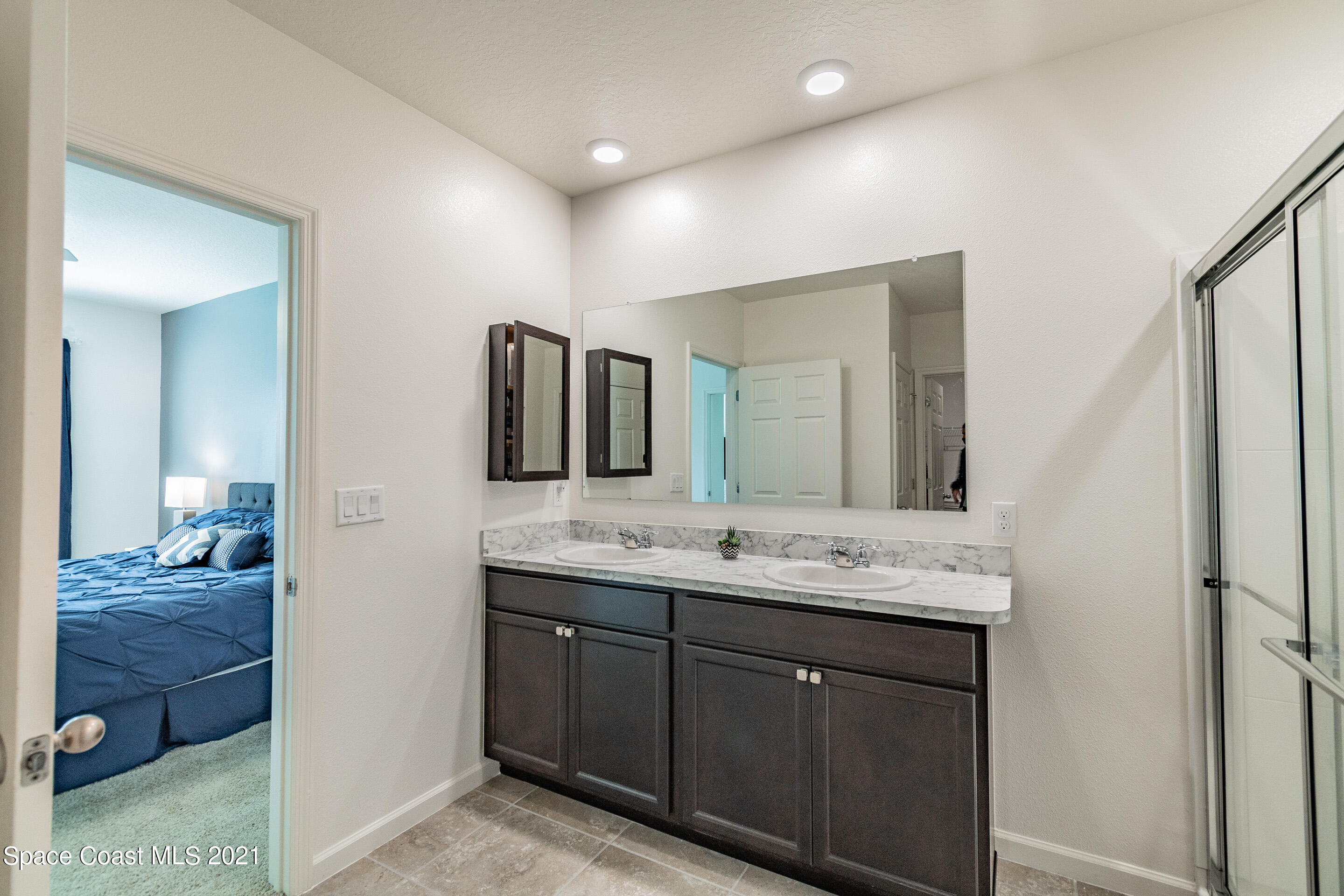 1581 Saxton Road Cocoa, FL 32926 - Photo 18 of 47 Owner's Bathroom