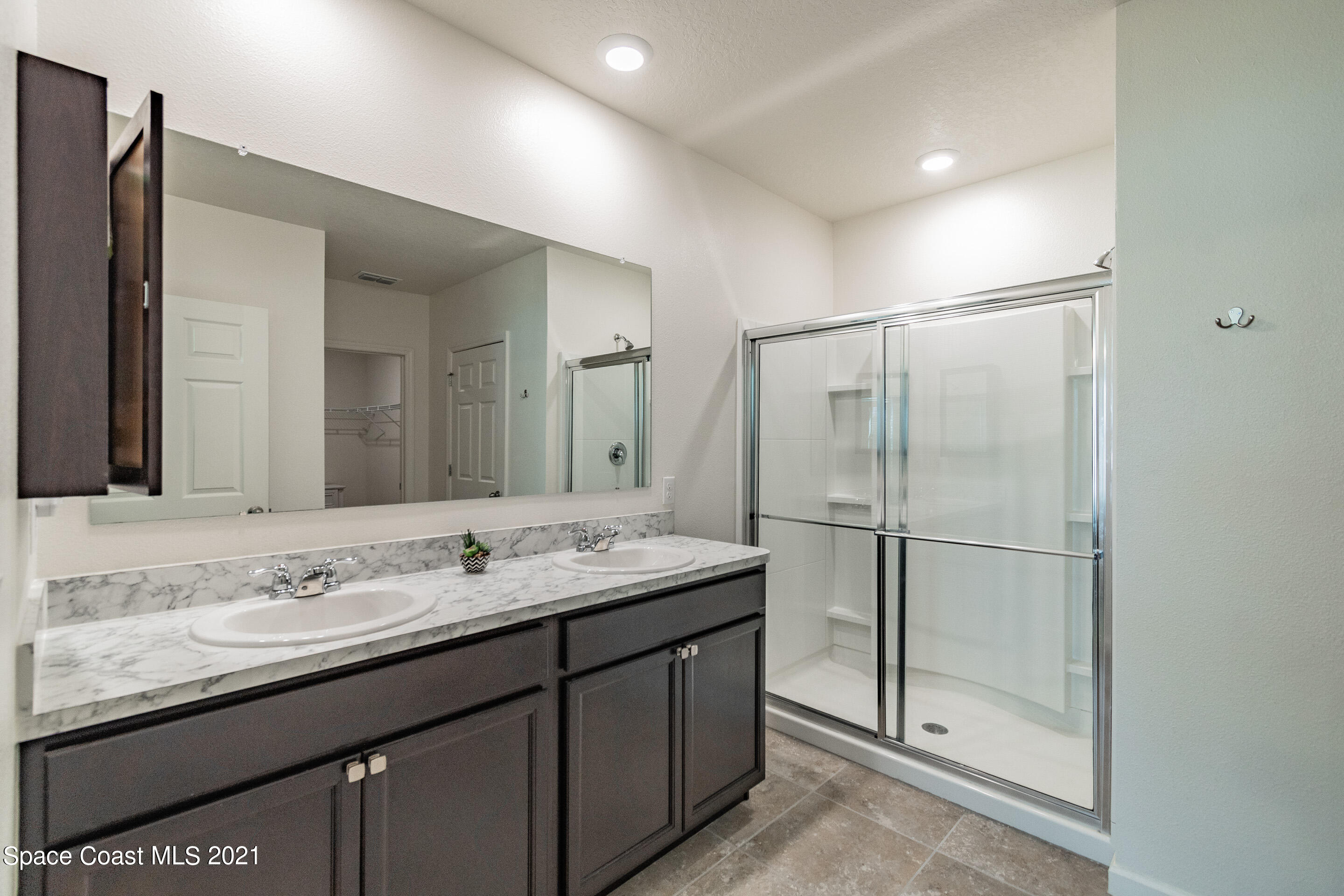 1581 Saxton Road Cocoa, FL 32926 - Photo 19 of 47 Owner's Bathroom