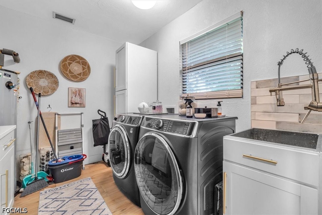 202 Ridgewood Avenue Clewiston, FL 33440 - Photo 37 of 50 a utility room with dryer and washer