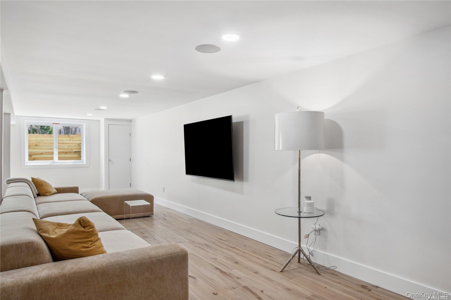 8 Deer Path Quogue, NY 11959 - Photo 16 of 23 Lower Level Entertainment Room