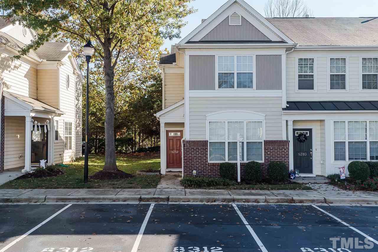 8312 City Loft Court Raleigh, NC 27613 - Photo 1 of 23 a front view of a house with a yard