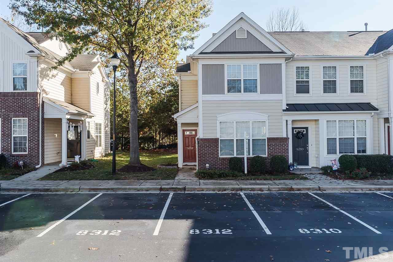 8312 City Loft Court Raleigh, NC 27613 - Photo 3 of 23 a front view of a house with garden