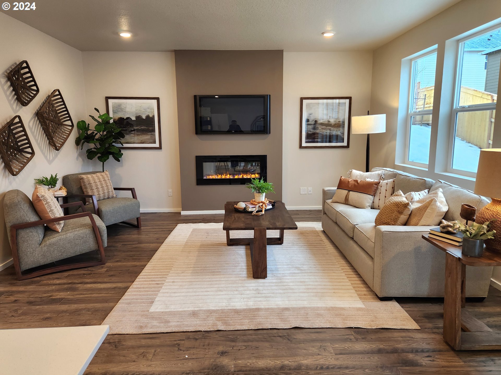 3352 Southeast Olvera Avenue Gresham, OR 97080 - Photo 11 of 23 a living room with furniture fireplace and a large window