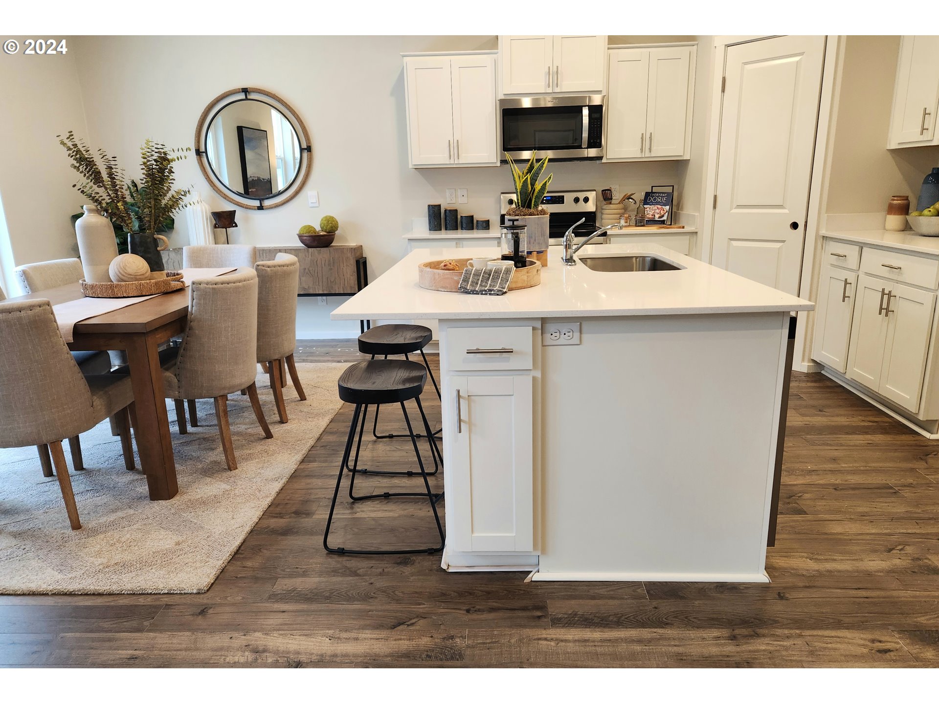 3352 Southeast Olvera Avenue Gresham, OR 97080 - Photo 9 of 23 a dining room with furniture and a mirror