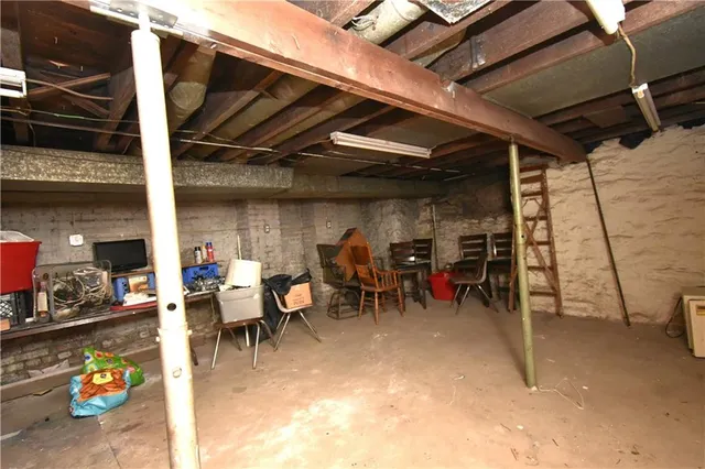 a view of a garage with chairs