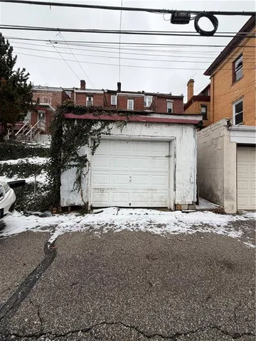 a view of a street with cars