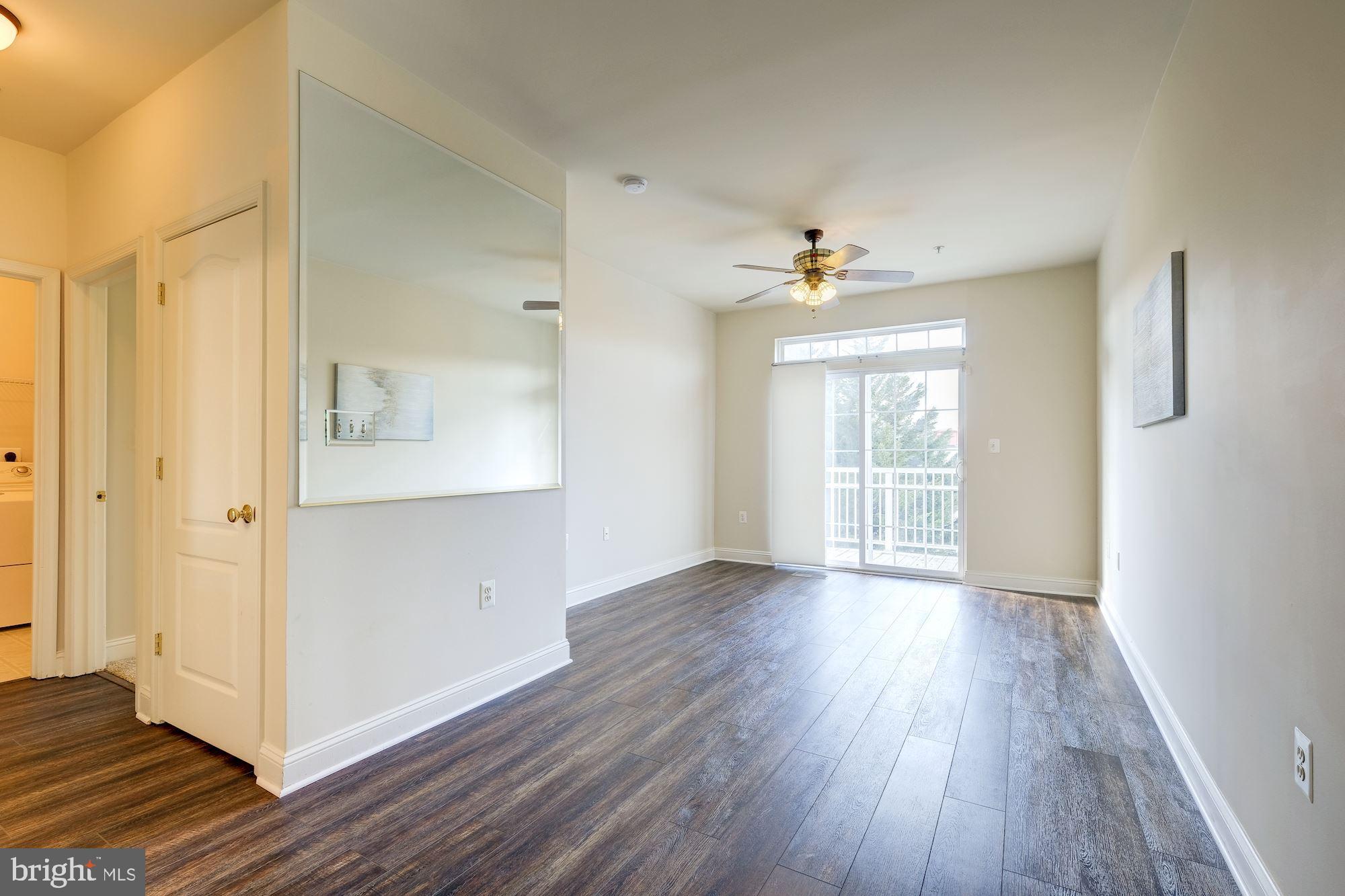 117 Bucksfield Road Gaithersburg, MD 20878 - Photo 11 of 29 Expansive upstairs Family Room with slider to deck