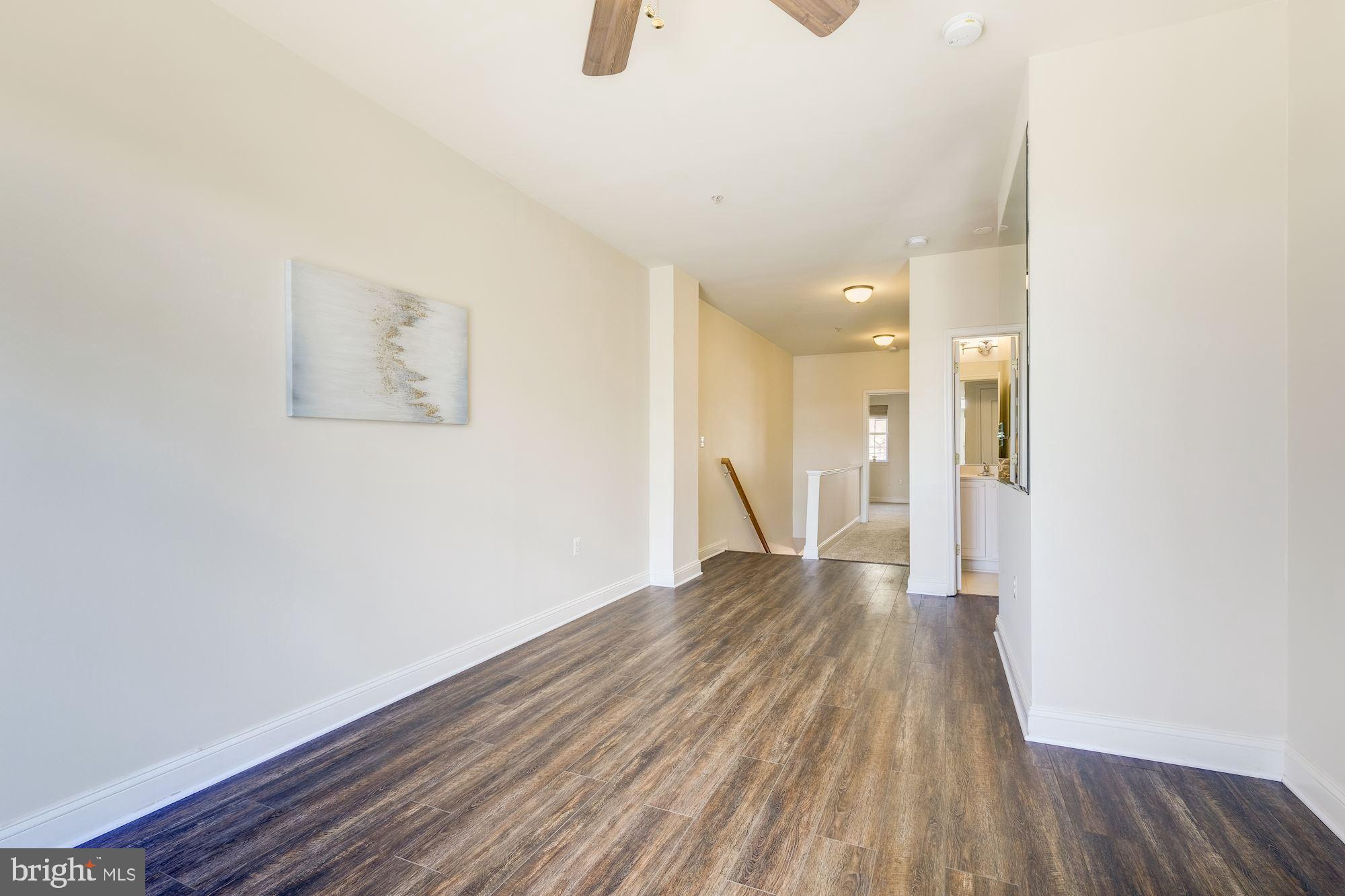 117 Bucksfield Road Gaithersburg, MD 20878 - Photo 13 of 29 Family Room with beautiful brand new LVT flooring