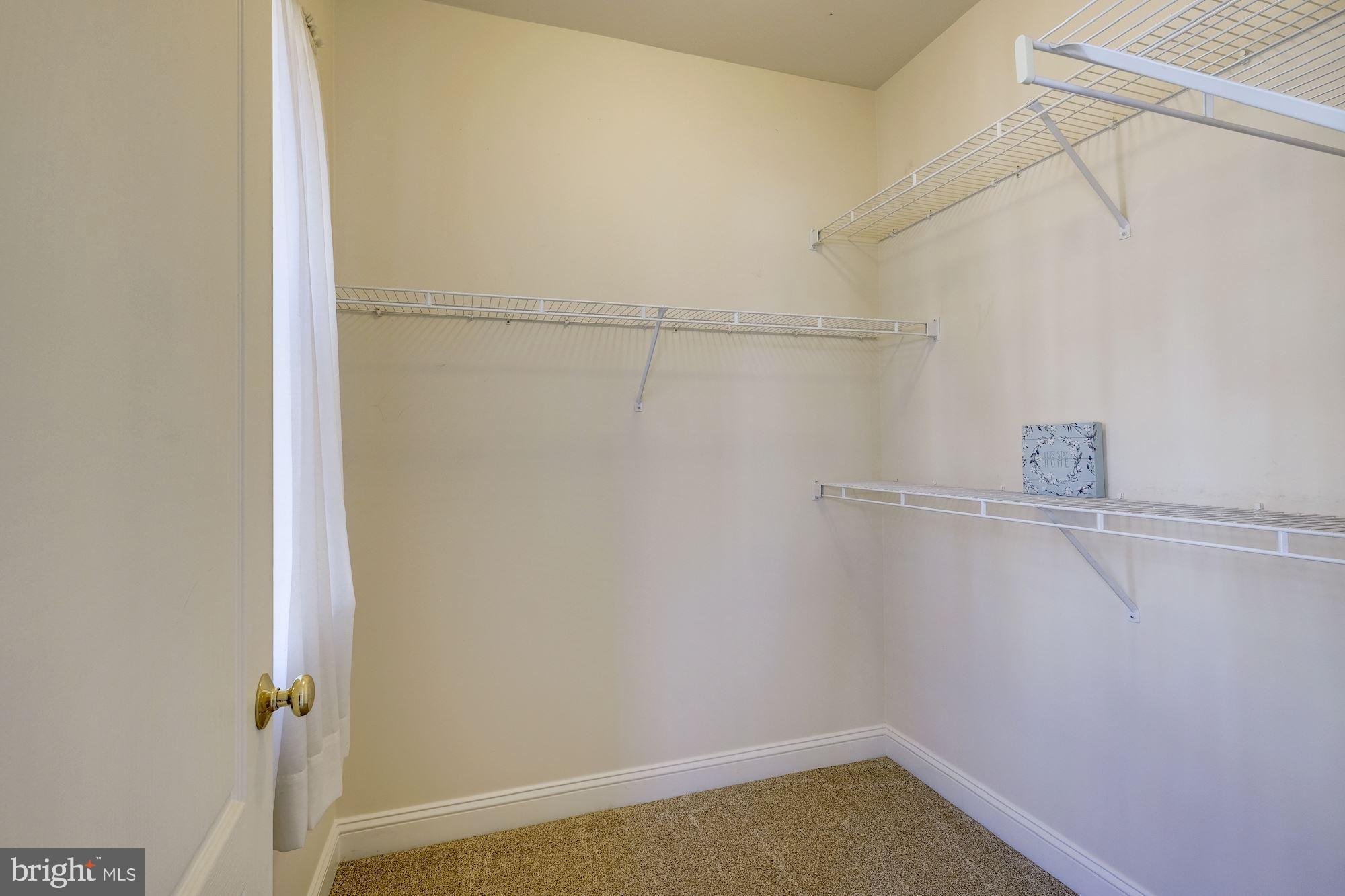 117 Bucksfield Road Gaithersburg, MD 20878 - Photo 16 of 29 Walk-in master bedroom closet