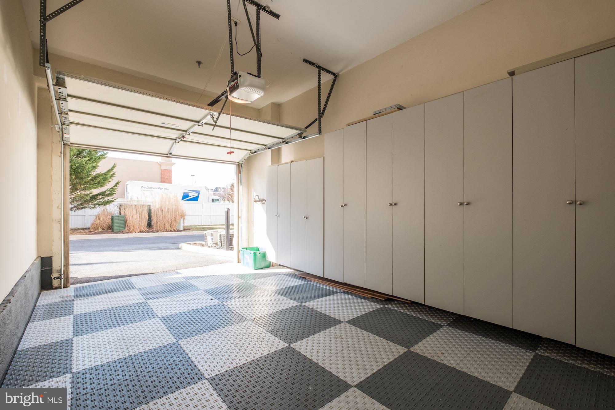 117 Bucksfield Road Gaithersburg, MD 20878 - Photo 25 of 29 Attached garage with custom storage and flooring