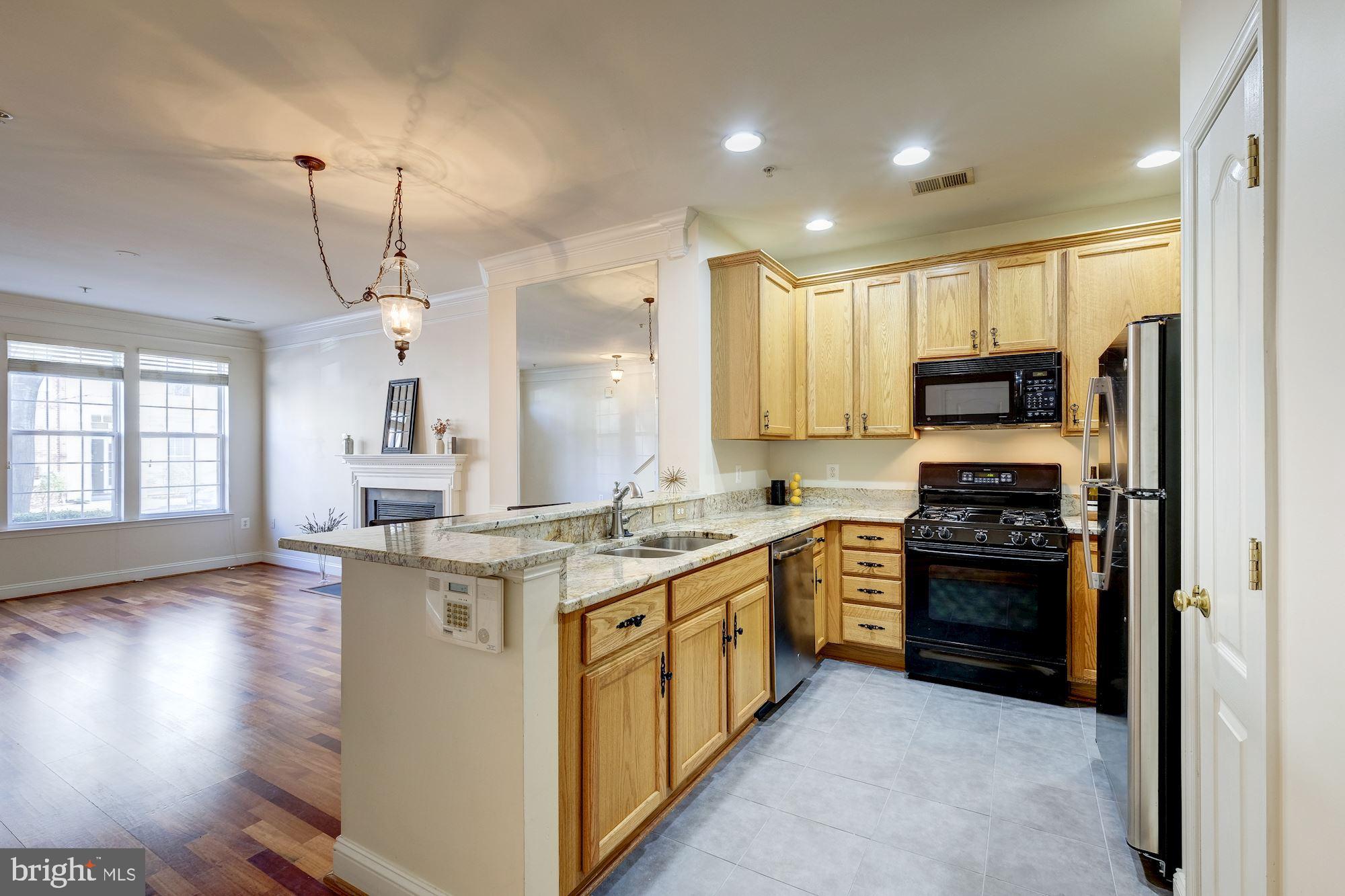 Updated kitchen with granite breakfast bar