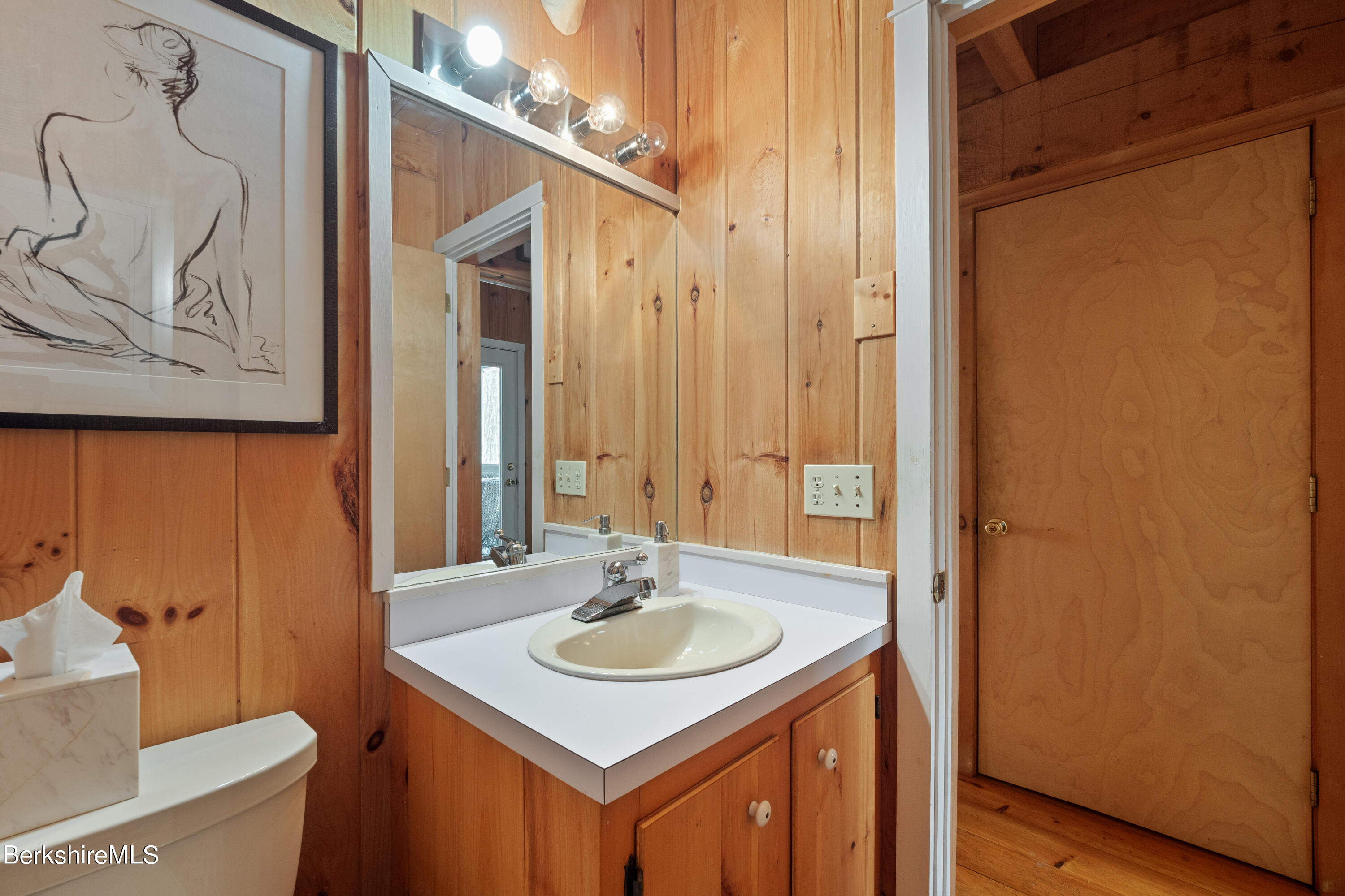 201 Judd Road Otis, MA 01253 - Photo 11 of 38 a bathroom with a sink and a mirror