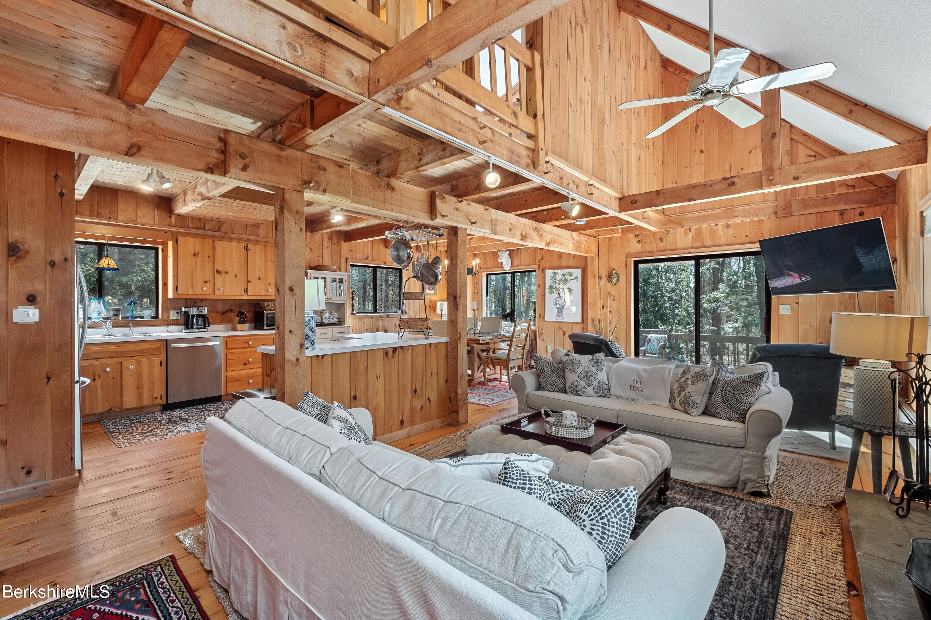 201 Judd Road Otis, MA 01253 - Photo 15 of 38 a living room with furniture and a view of kitchen