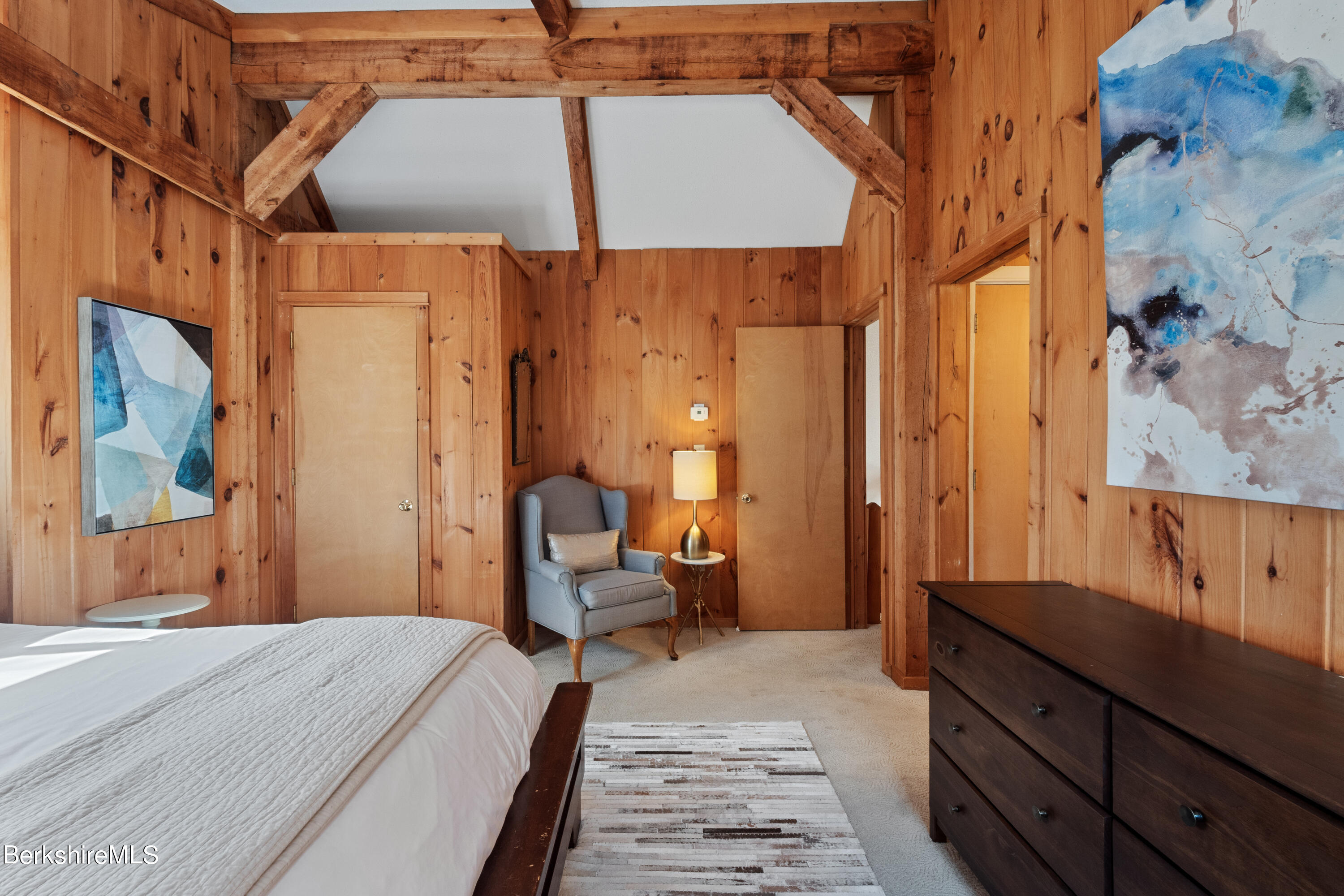 201 Judd Road Otis, MA 01253 - Photo 23 of 38 a bedroom with a bed and wooden floor