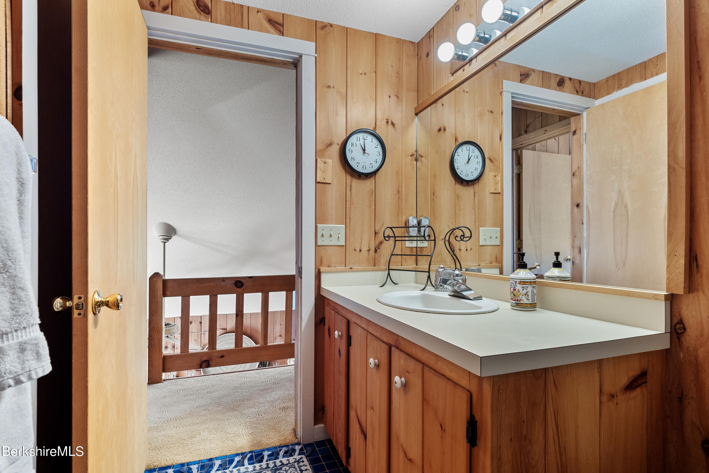 201 Judd Road Otis, MA 01253 - Photo 25 of 38 a bathroom with a sink and a mirror