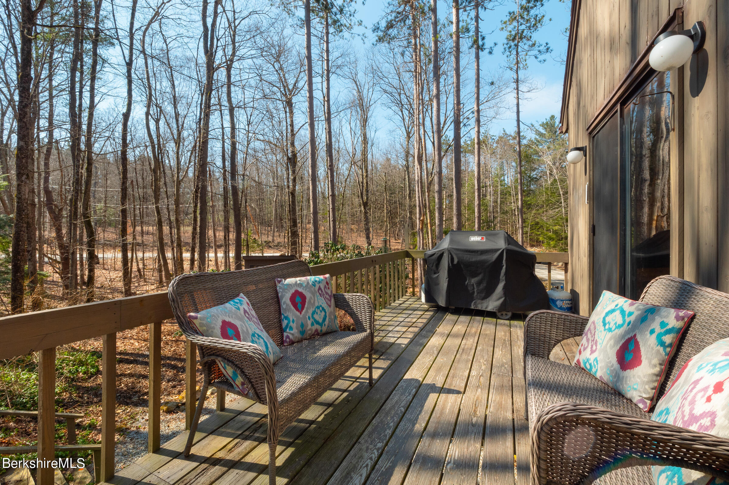 201 Judd Road Otis, MA 01253 - Photo 8 of 38 a view of balcony with couch and outdoor seating
