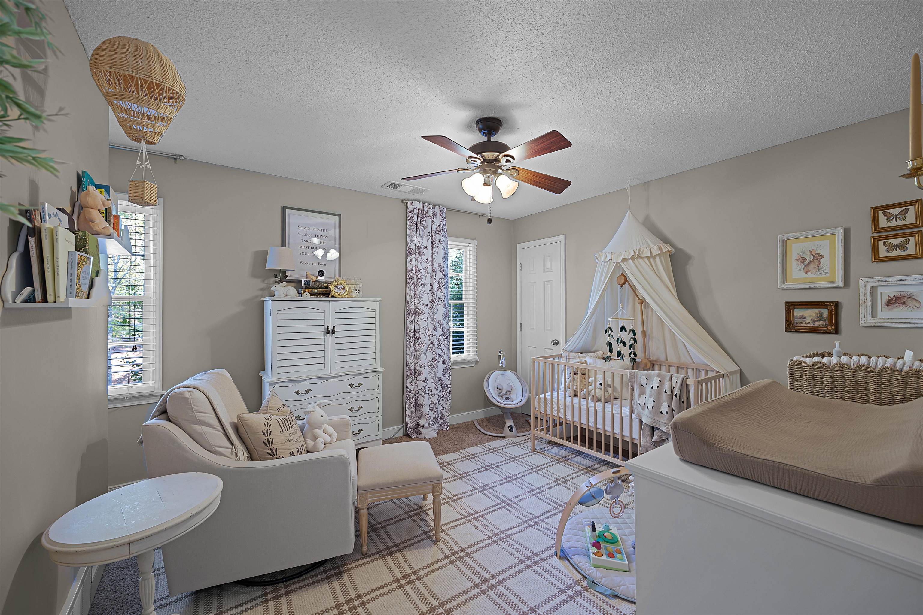 319 East Harpers Ferry Road Collierville, TN 38017 - Photo 19 of 27 Carpeted bedroom featuring a textured ceiling, ceiling fan, and a crib