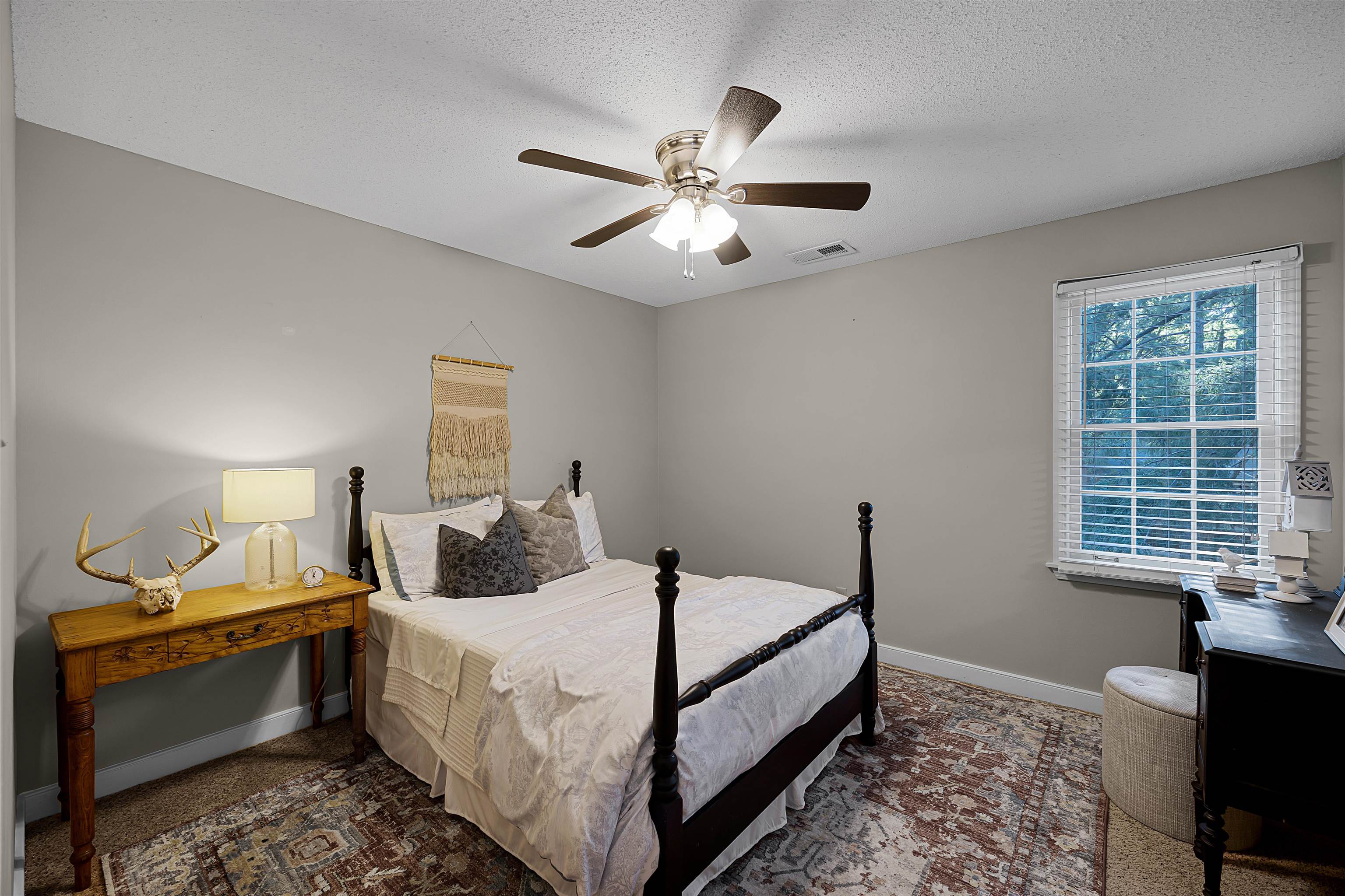 319 East Harpers Ferry Road Collierville, TN 38017 - Photo 22 of 27 Bedroom with ceiling fan, carpet, and a textured ceiling