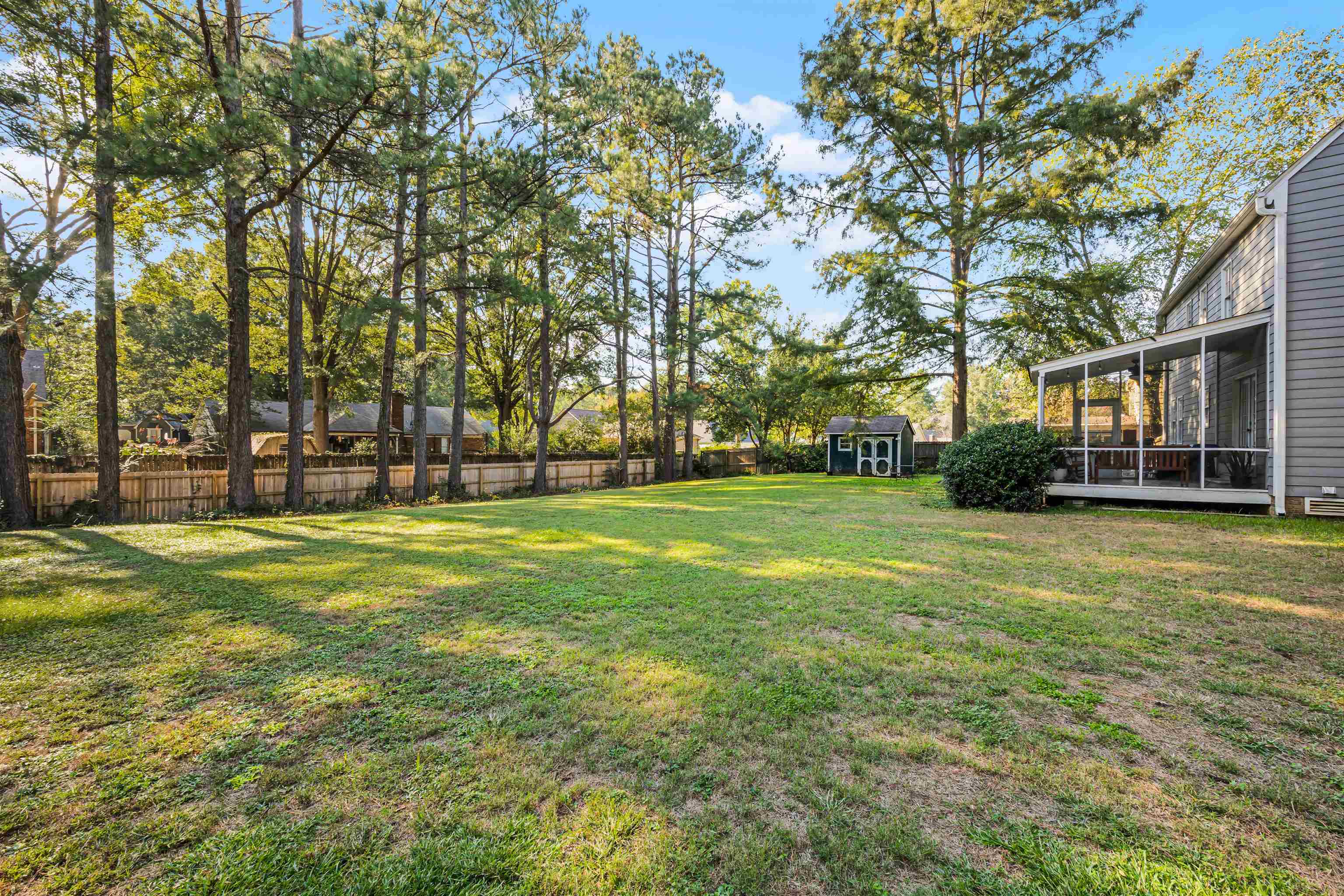 319 East Harpers Ferry Road Collierville, TN 38017 - Photo 26 of 27 View of yard featuring a sunroom and a shed