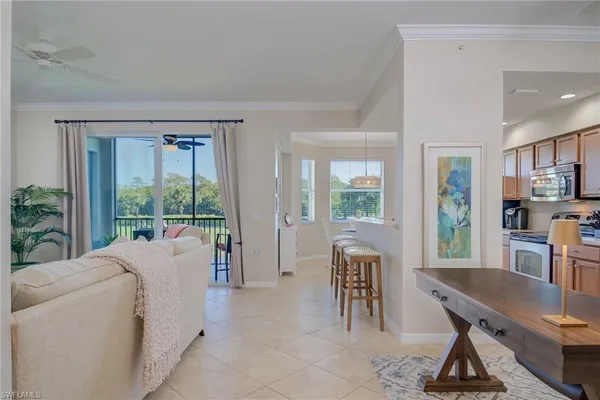 a living room with furniture and a table