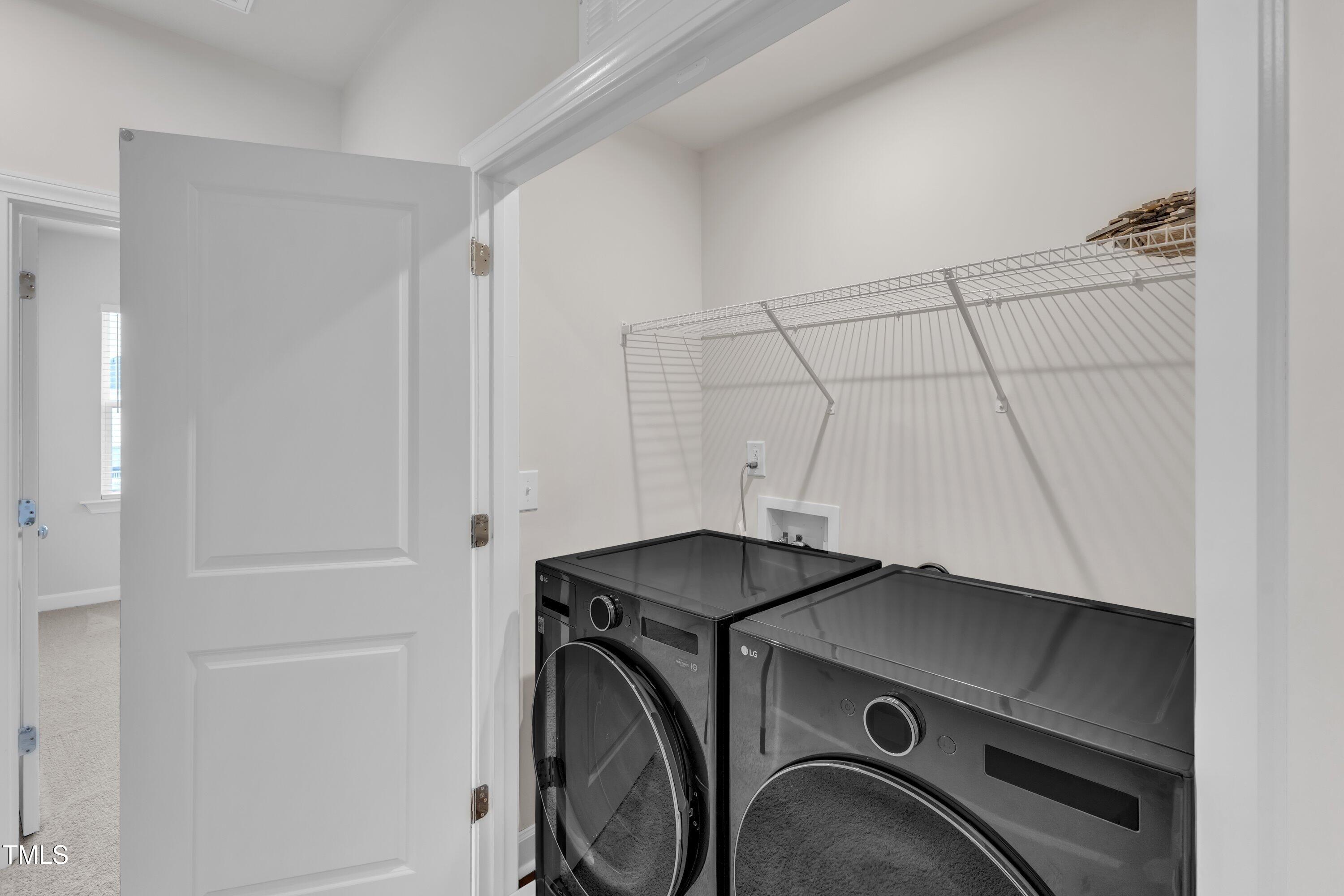 816 Lilyquist Way Wake Forest, NC 27587 - Photo 38 of 53 a utility room with dryer and washer