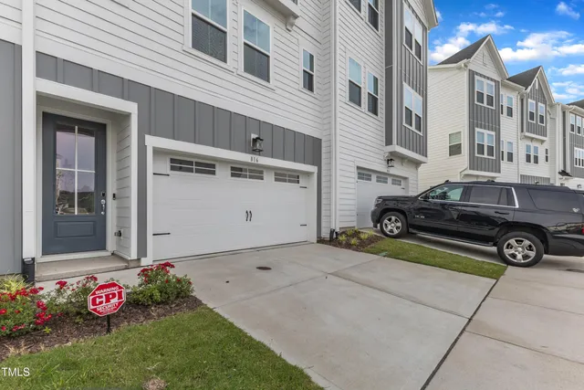 a car parked in front of a house