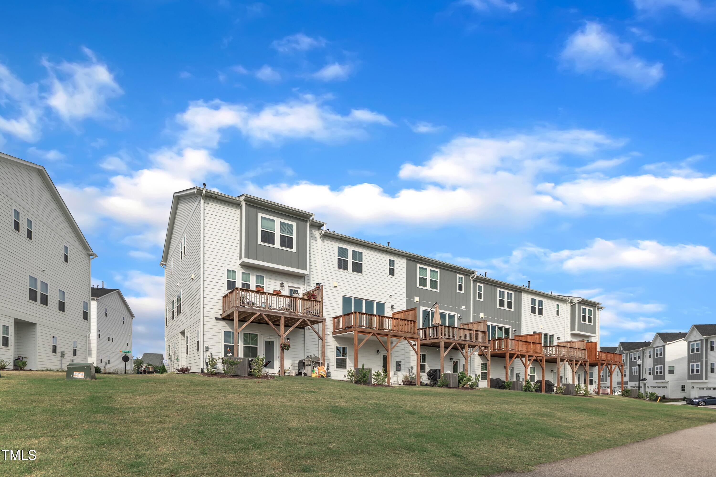 816 Lilyquist Way Wake Forest, NC 27587 - Photo 45 of 53 a front view of building with yard