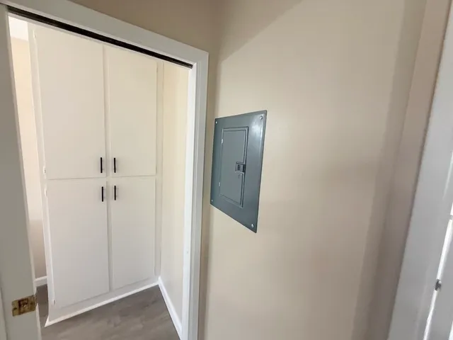 a white toilet sitting next to a bath tub