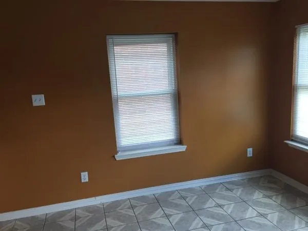 a view of an empty room with window