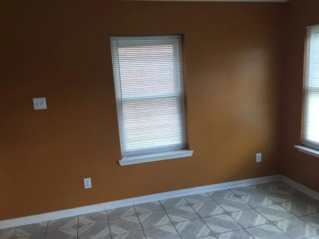 a view of an empty room with window