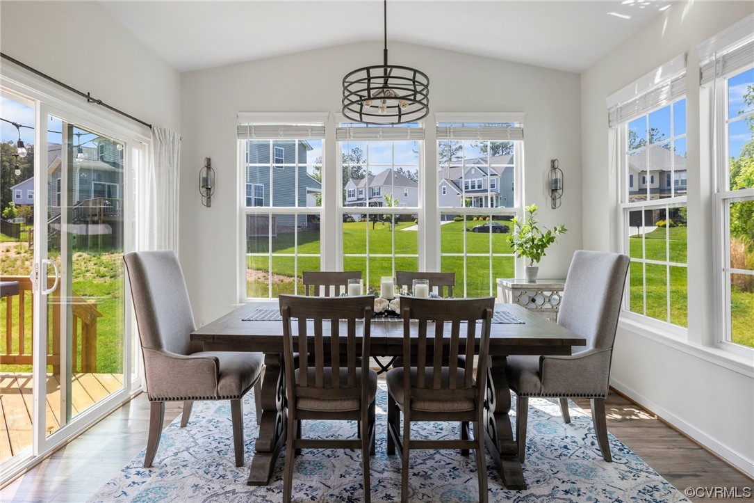 8125 Timberstone Drive Chesterfield, VA 23832 - Photo 15 of 34 a view of a dining room with furniture window and wooden floor